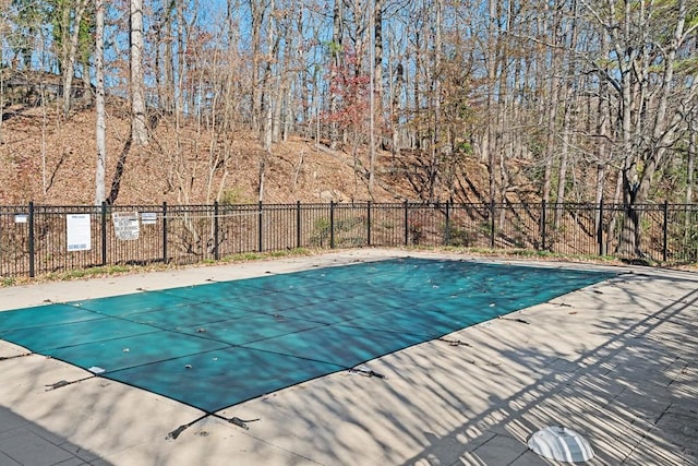 view of pool featuring a fenced in pool and fence