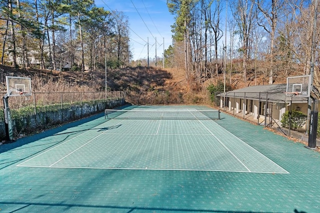 view of sport court featuring fence and community basketball court