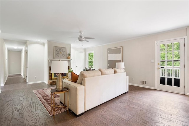 3131 Garden Lane Dr, Marietta, GA 30062 - living room with ceiling fan, wood finished floors, crown molding, and baseboards