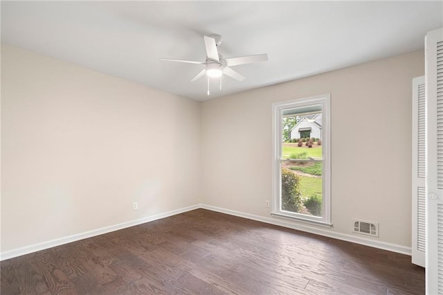 3131 Garden Lane Dr, Marietta, GA 30062 - spare room featuring a ceiling fan, dark wood-type flooring, and baseboards