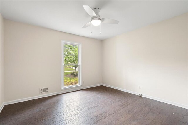 3131 Garden Lane Dr, Marietta, GA 30062 - unfurnished room featuring dark wood finished floors, baseboards, and ceiling fan