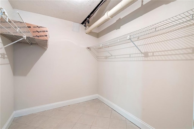 3131 Garden Lane Dr, Marietta, GA 30062 - spacious closet with light tile patterned floors