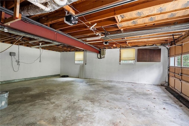 3131 Garden Lane Dr, Marietta, GA 30062 - garage featuring a garage door opener