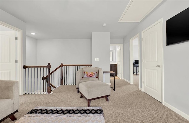 living area with carpet flooring