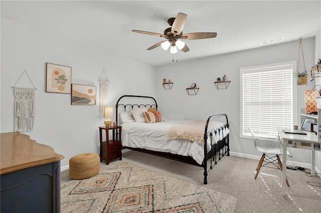 bedroom with light colored carpet and ceiling fan