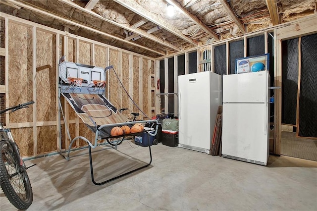 basement with white refrigerator