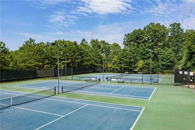 view of sport court featuring basketball hoop