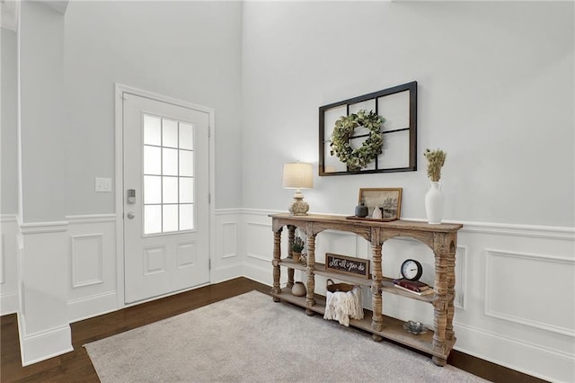 foyer with dark wood-type flooring