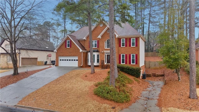 colonial home with a garage