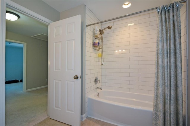 full bath featuring shower / bathtub combination with curtain and baseboards