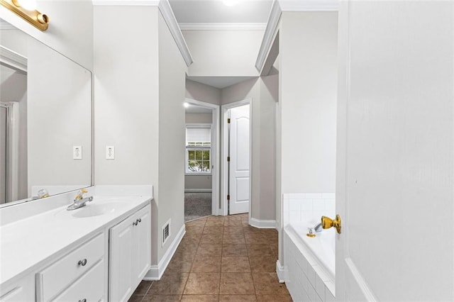 full bath with visible vents, a garden tub, tile patterned flooring, crown molding, and vanity