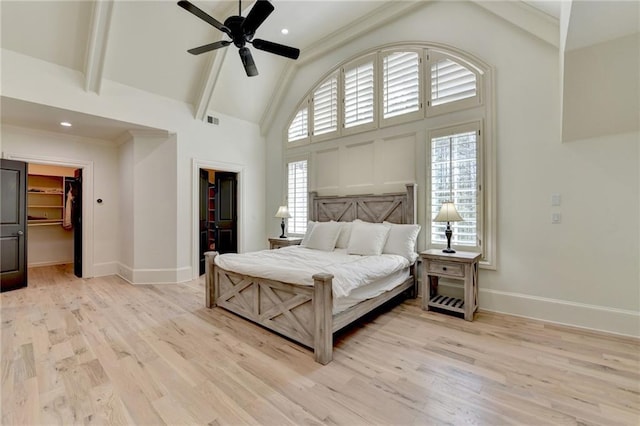 4505 Whitestone Way, Suwanee, GA 30024 - bedroom with visible vents, high vaulted ceiling, a walk in closet, and multiple windows