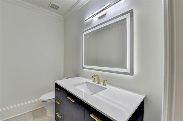 4505 Whitestone Way, Suwanee, GA 30024 - half bathroom with vanity, baseboards, ornamental molding, toilet, and visible vents