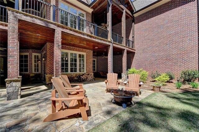4505 Whitestone Way, Suwanee, GA 30024 - view of patio featuring a fire pit
