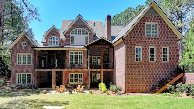4505 Whitestone Way, Suwanee, GA 30024 - back of property featuring a patio area, brick siding, a yard, and a chimney