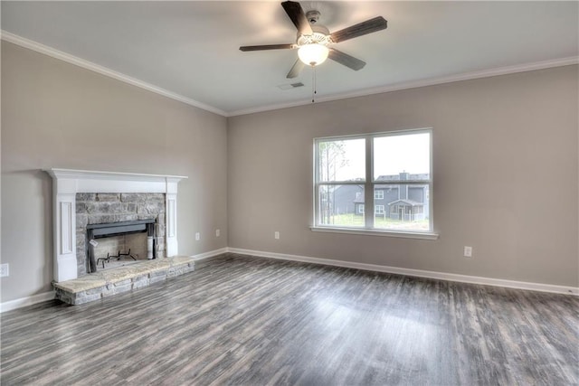 unfurnished living room featuring baseboards and ornamental molding