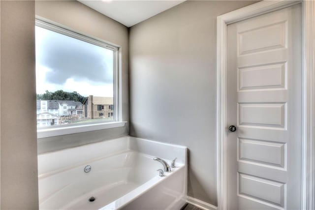 full bathroom featuring a bath