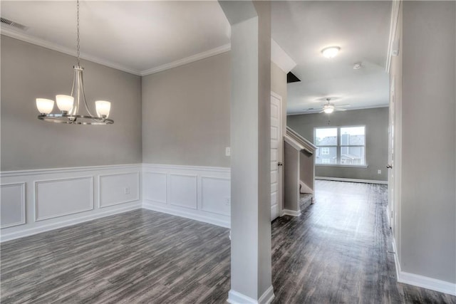 unfurnished room featuring stairs, visible vents, dark wood-style flooring, and ornamental molding