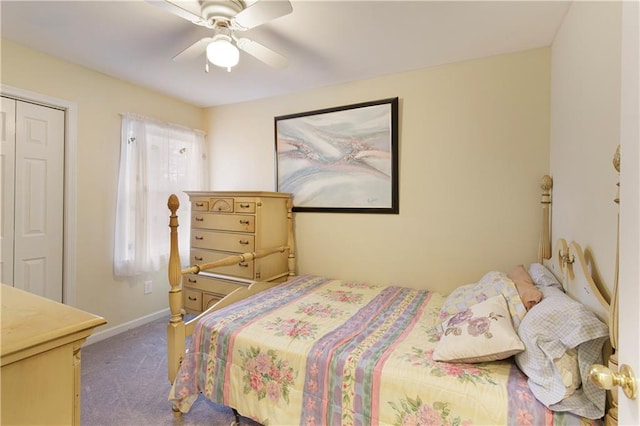 carpeted bedroom featuring baseboards and ceiling fan