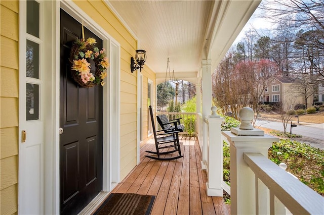 wooden deck with a porch