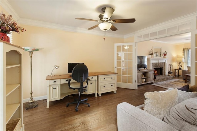 office space featuring ornamental molding, french doors, a ceiling fan, and wood finished floors