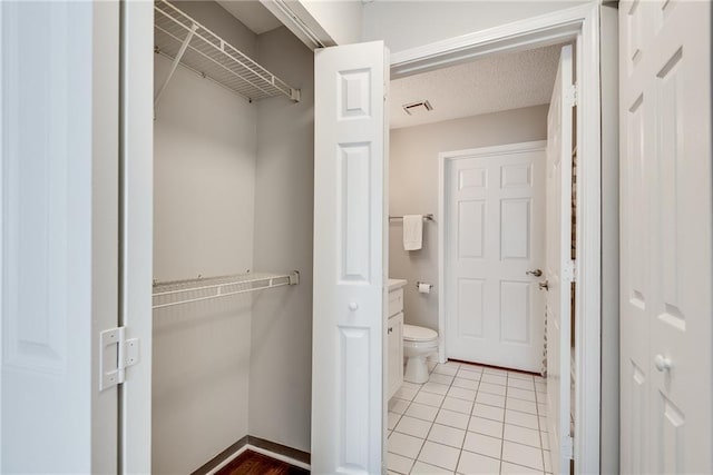 closet featuring visible vents