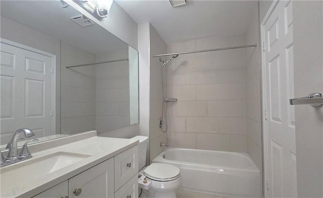 1074 Peachtree Walk NE Unit B 216, Atlanta, GA 30309 - bathroom featuring vanity, toilet, tub / shower combination, and visible vents