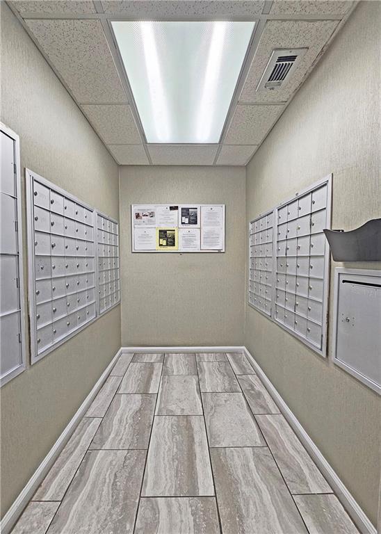 1074 Peachtree Walk NE Unit B 216, Atlanta, GA 30309 - view of property's community with mail area and visible vents