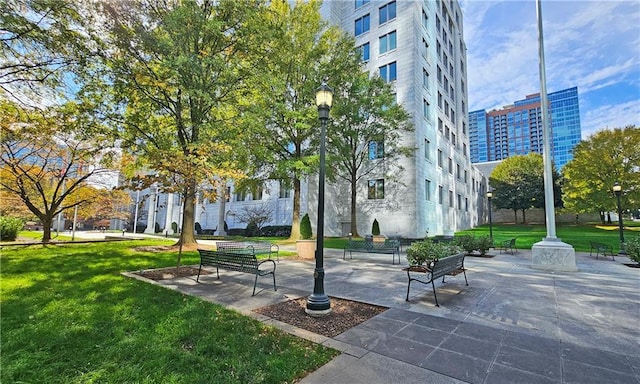 1074 Peachtree Walk NE Unit B 216, Atlanta, GA 30309 - view of community with a patio area and a lawn