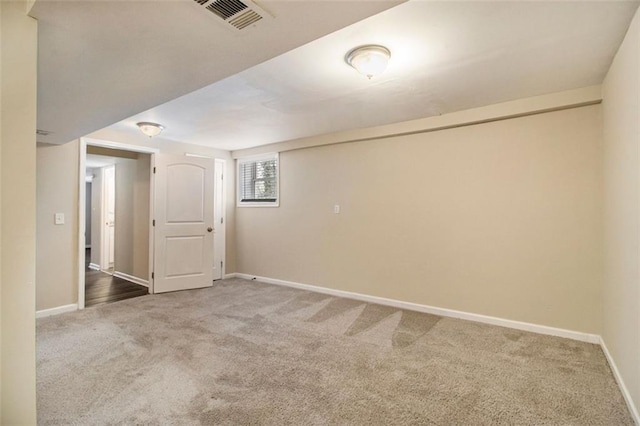 unfurnished room featuring carpet flooring