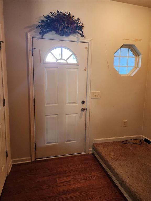 doorway featuring dark hardwood / wood-style floors