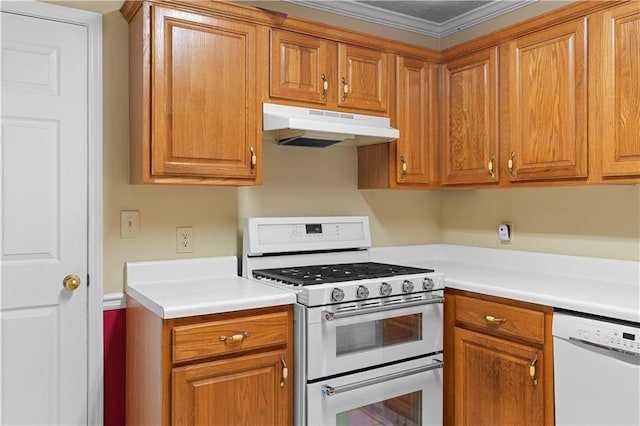 2881 Bridle Creek Dr SW, Conyers, GA 30094 - kitchen featuring white appliances, under cabinet range hood, brown cabinets, light countertops, and ornamental molding