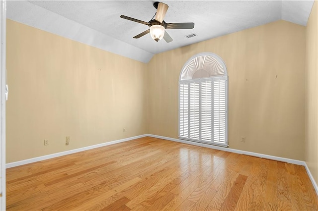 2881 Bridle Creek Dr SW, Conyers, GA 30094 - unfurnished room featuring vaulted ceiling, ceiling fan, wood finished floors, and baseboards