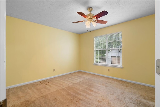 2881 Bridle Creek Dr SW, Conyers, GA 30094 - empty room with light carpet, baseboards, a textured ceiling, and a ceiling fan