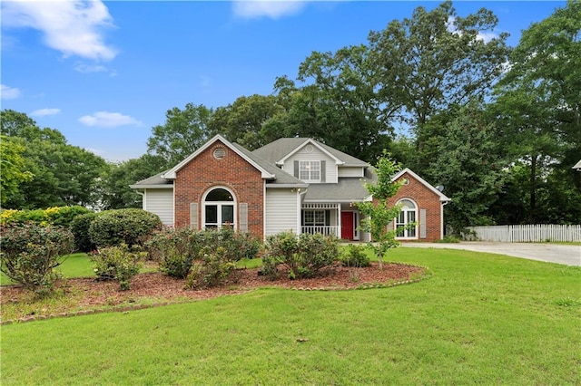2881 Bridle Creek Dr SW, Conyers, GA 30094 - traditional-style house with brick siding and view of scattered trees