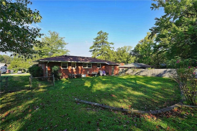 exterior space featuring a front lawn