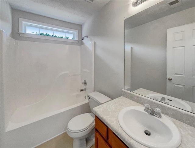 full bathroom with toilet, vanity, tile patterned flooring, and washtub / shower combination