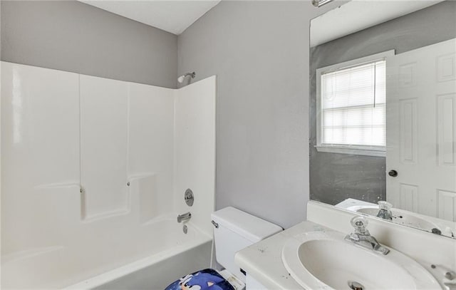 full bathroom featuring vanity, shower / bathtub combination, and toilet