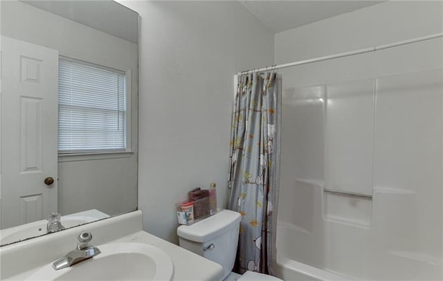 full bathroom with vanity, toilet, and shower / bath combo