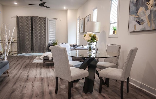 dining room featuring wood-type flooring and ceiling fan