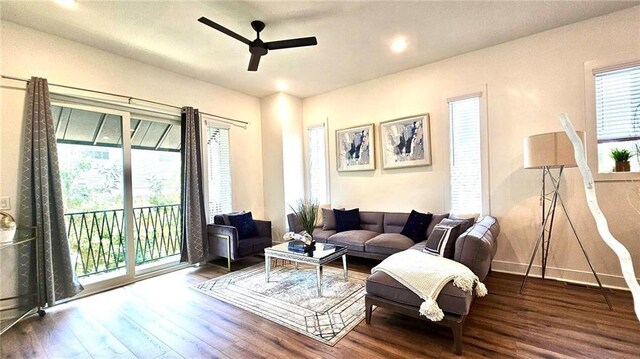 living room with hardwood / wood-style flooring, a healthy amount of sunlight, and ceiling fan