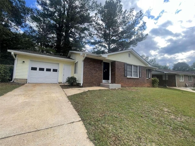 view of front of home with a garage and a front yard