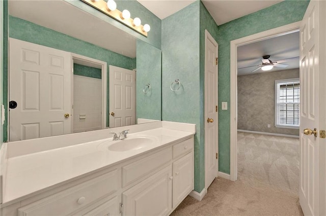 4910 Aldbury Ln, Suwanee, GA 30024 - bathroom with vanity, ceiling fan, and baseboards