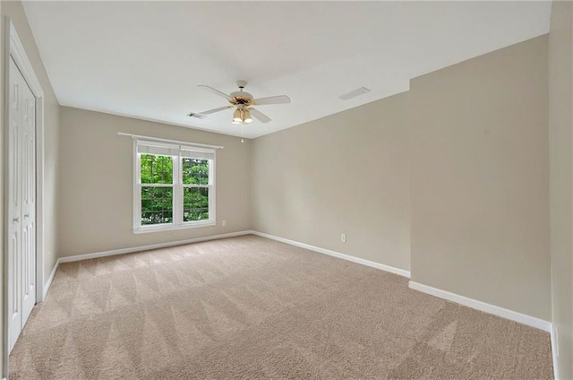4910 Aldbury Ln, Suwanee, GA 30024 - carpeted spare room featuring ceiling fan and baseboards