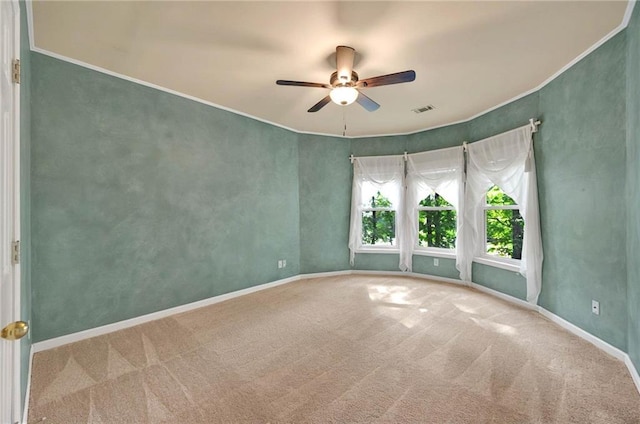 4910 Aldbury Ln, Suwanee, GA 30024 - carpeted spare room with a ceiling fan, crown molding, and baseboards