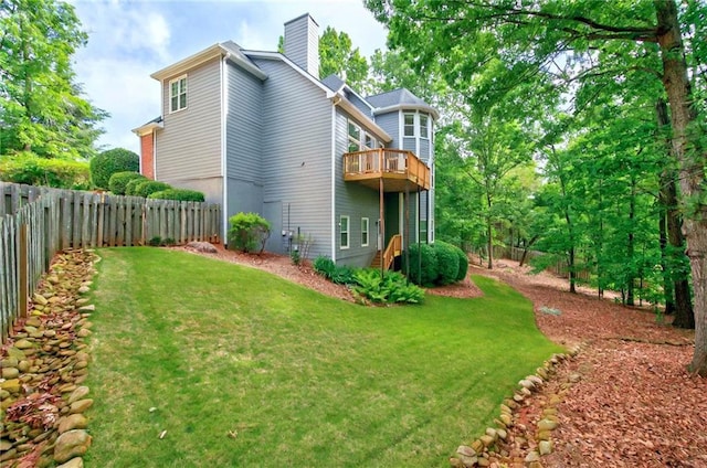 4910 Aldbury Ln, Suwanee, GA 30024 - back of house with a chimney and a deck