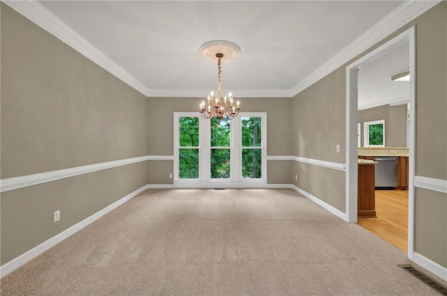 4910 Aldbury Ln, Suwanee, GA 30024 - empty room featuring a chandelier, light carpet, baseboards, and crown molding