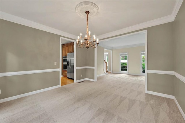 4910 Aldbury Ln, Suwanee, GA 30024 - spare room with a chandelier, crown molding, light colored carpet, and baseboards