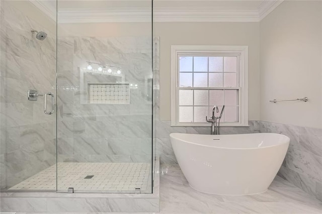 bathroom featuring ornamental molding and shower with separate bathtub