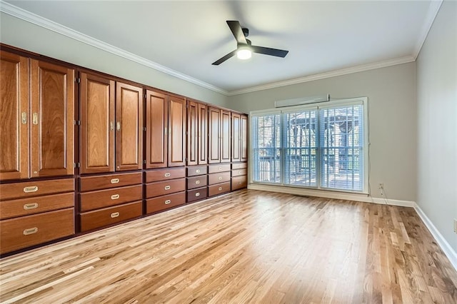 unfurnished room featuring light hardwood / wood-style flooring, ornamental molding, and ceiling fan